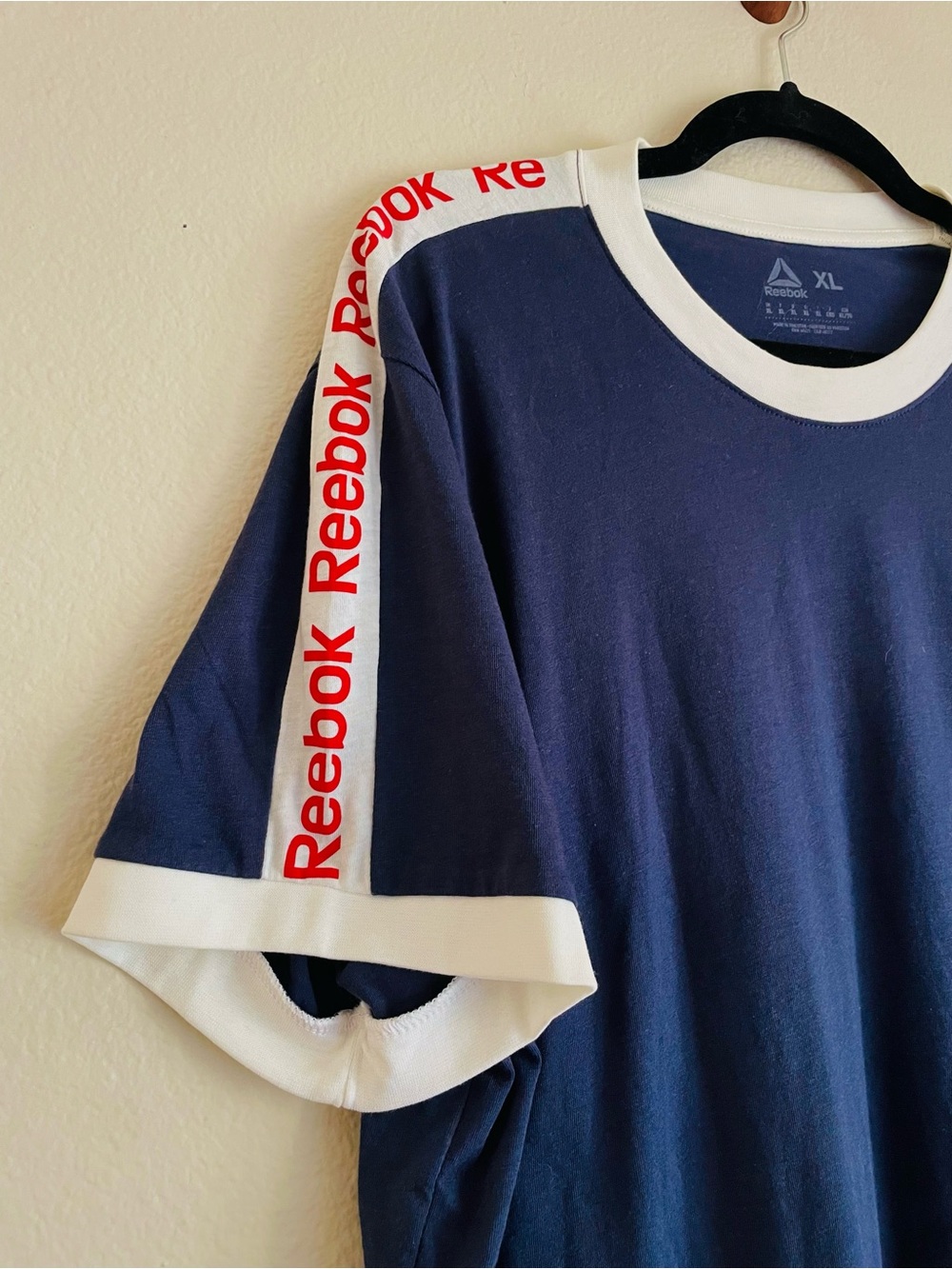 Reebok Navy Short-Sleeve Tee with White Trim and Red Shoulder Logo - Picture 2 of 3